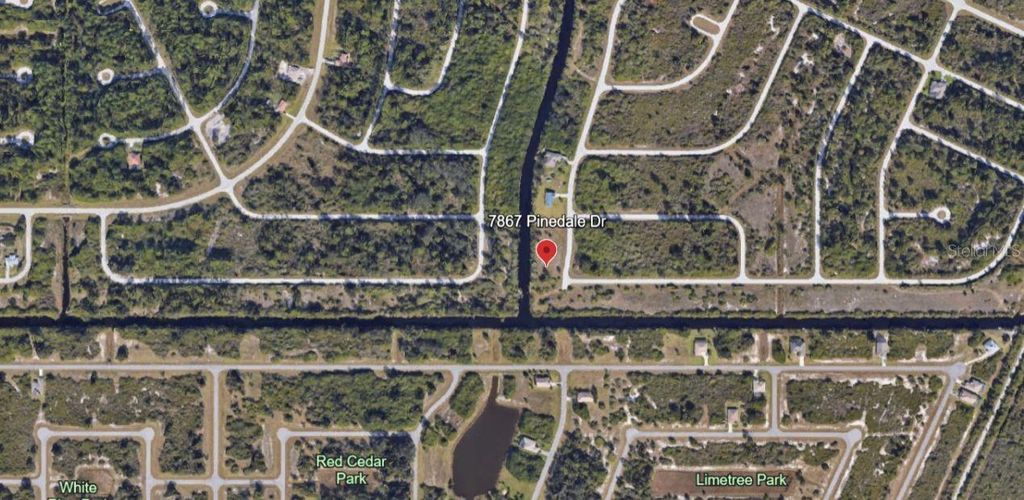 Photo of 7867 Pinedale Drive, Port Charlotte, FL 33981 (MLS # C7502025)