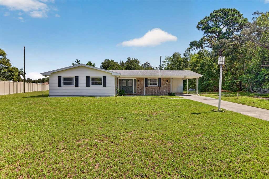 Photo of 7502 Pond Circle, Spring Hill, FL 34606 (MLS # TB8532722)