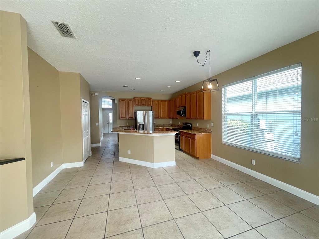 Photo of 10366 Cypress Knee Circle, Orlando, FL 32825 (MLS # O6435221)