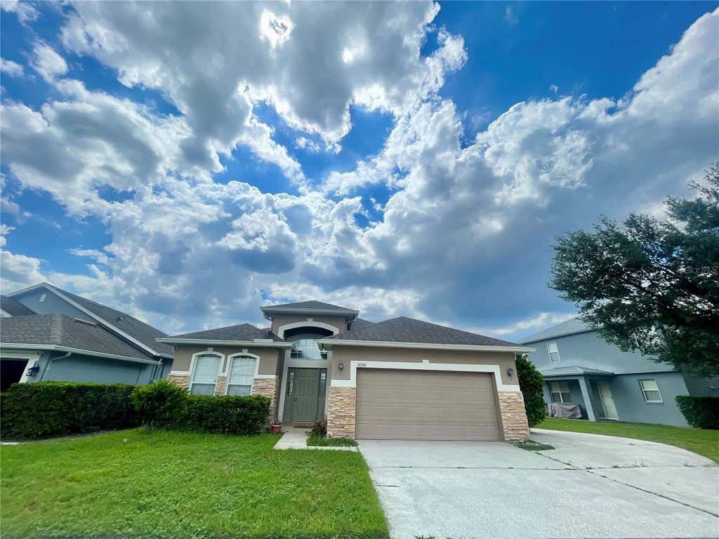 Photo of 10366 Cypress Knee Circle, Orlando, FL 32825 (MLS # O6435221)