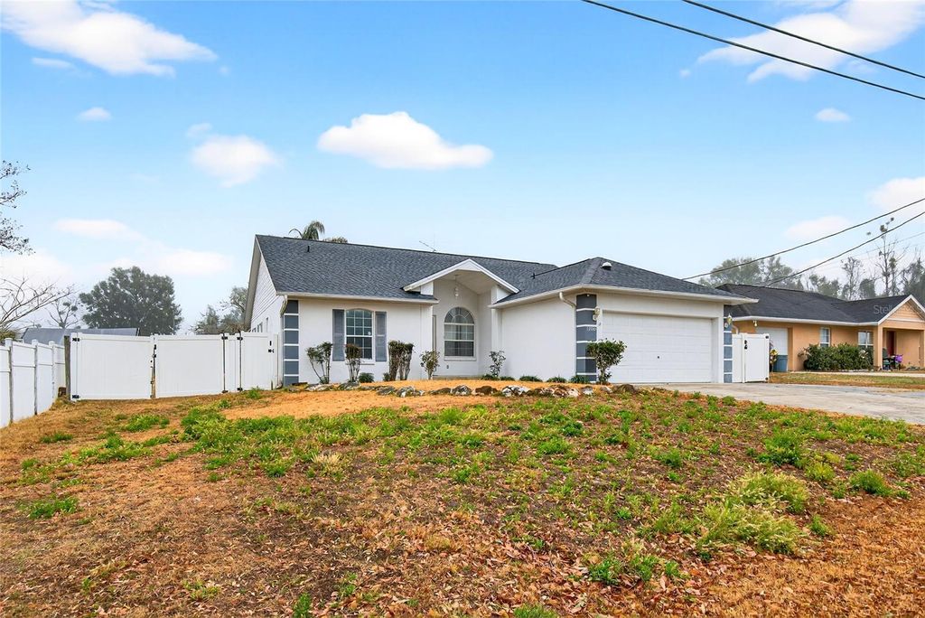 Photo of 13599 SE 51st Terrace, Summerfield, FL 34491 (MLS # OM718378)