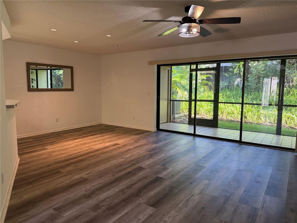 Photo of 1913 Whispering Way, Tarpon Springs, FL 34689 (MLS # W7883425)