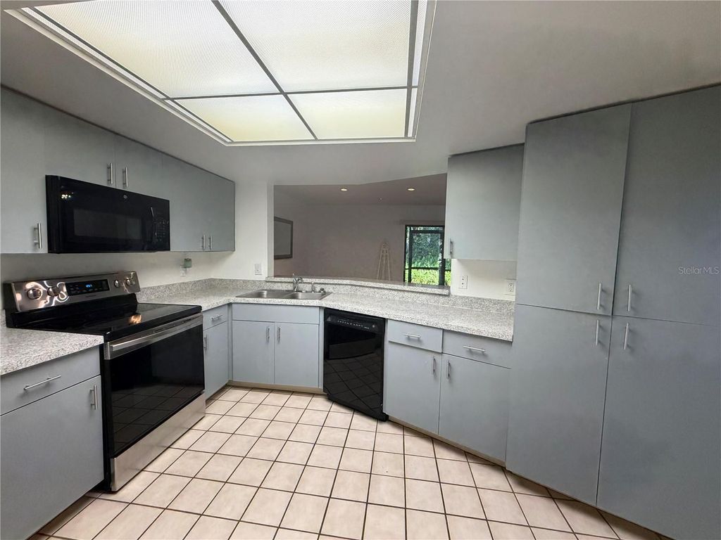 Photo of 1913 Whispering Way, Tarpon Springs, FL 34689 (MLS # W7883425)