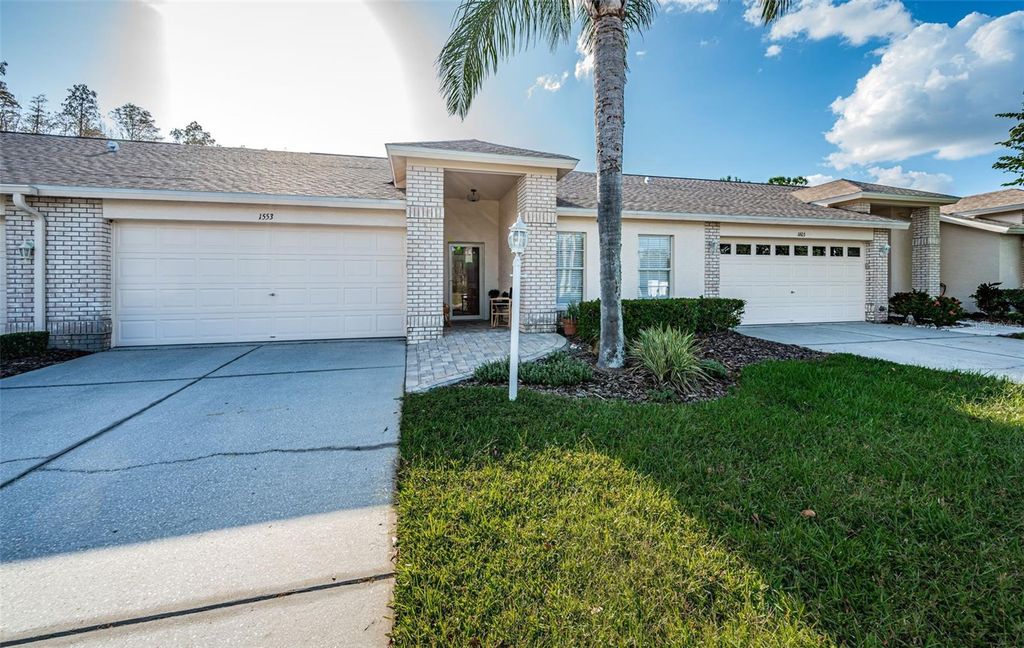 Photo of 1553 Arlington Oaks Court, Trinity, FL 34655 (MLS # W7869324)