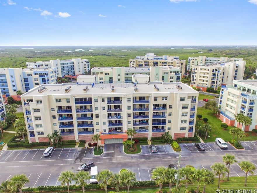 PENTHOUSE LEVEL 3 bedroom 3 bathroom condo with over 2,000 sq. ft. with beautiful OCEAN VIEWS! This incredibly spacious and bright condo is located in the highly desirable complex of Ocean Walk. Oceanwalk Condominiums features every amenity imaginable - exercise room, sauna, pool, poolside spa, pool decks, walkway around pool area, two lighted tennis courts, two shuffleboard courts, lighted basketball hoop, clubhouse w/covered vehicle entrance, BBQ area and more. The interior finishes of your new beach condo are light and bright and lend to any style of decor. Towards the front of the condo is located your oversized third bedroom and full bathroom along with your laundry room. The kitchen, dining and living room are all open and showcase views of the Atlantic Ocean and separate your two master suites. On one side is your main master suite with sitting room and sliding glass doors out to the balcony. Not to mention OCEAN VIEWS and a large walk in closet and ensuite spa bathroom. On the other side of the living areas is your secondary master suite with enough space for two beds or king size bed its own private ensuite bathroom and large closet space. Both master bedrooms open up to the balcony with views of the OCEAN. Enjoy living at the top in this 6th floor condo and enjoy walking a few steps to the white sand beaches of New Smyrna Beach! Schedule your showing today! ;LocationDescription: Condo ;Water: City