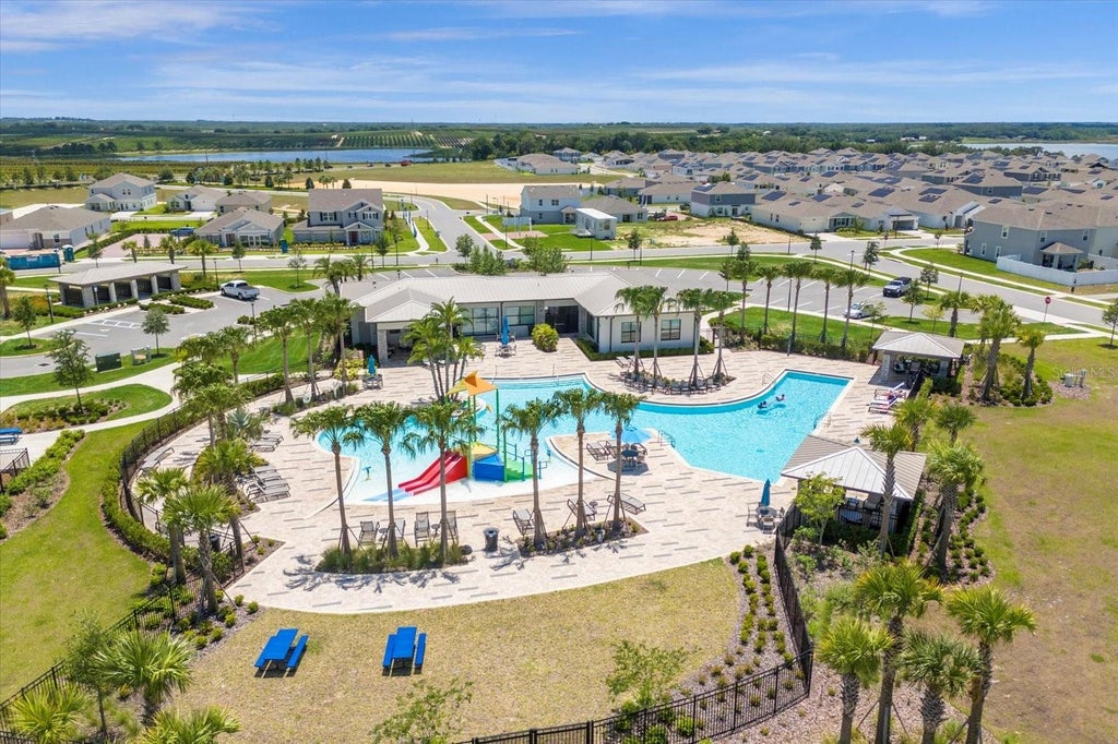 Photo of 6997 Perch Hammock Loop, Groveland, FL 34736 (MLS # O6441389)