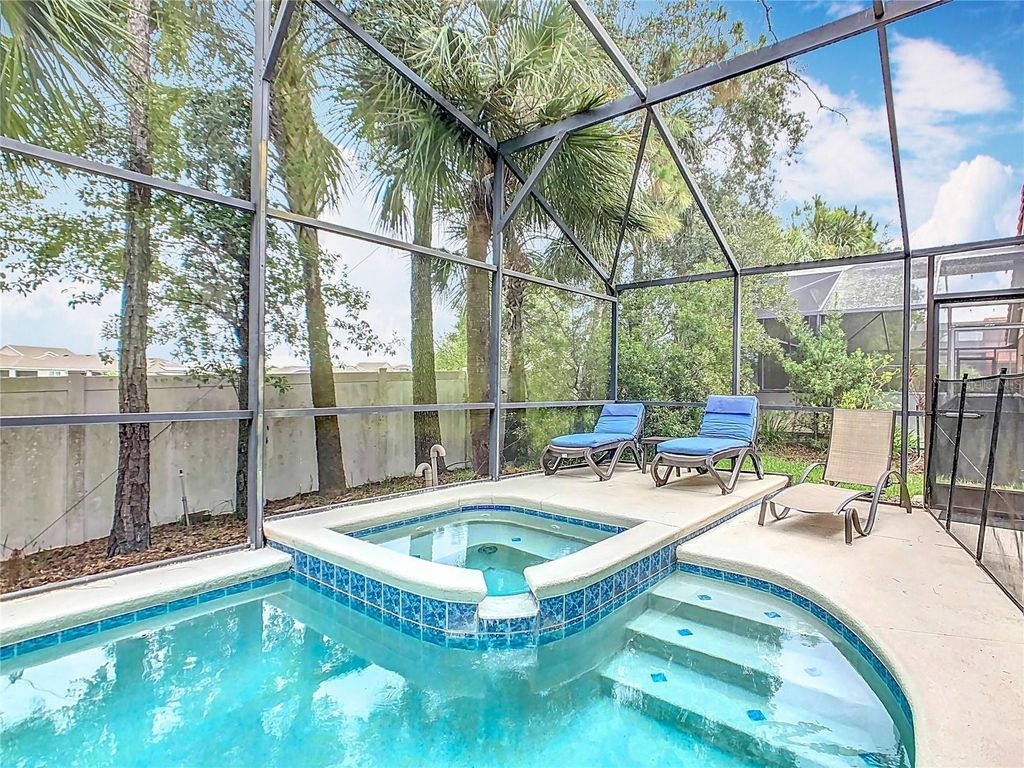 Photo of 512 Viola Dr, Davenport, FL 33837 (MLS # O6384608)