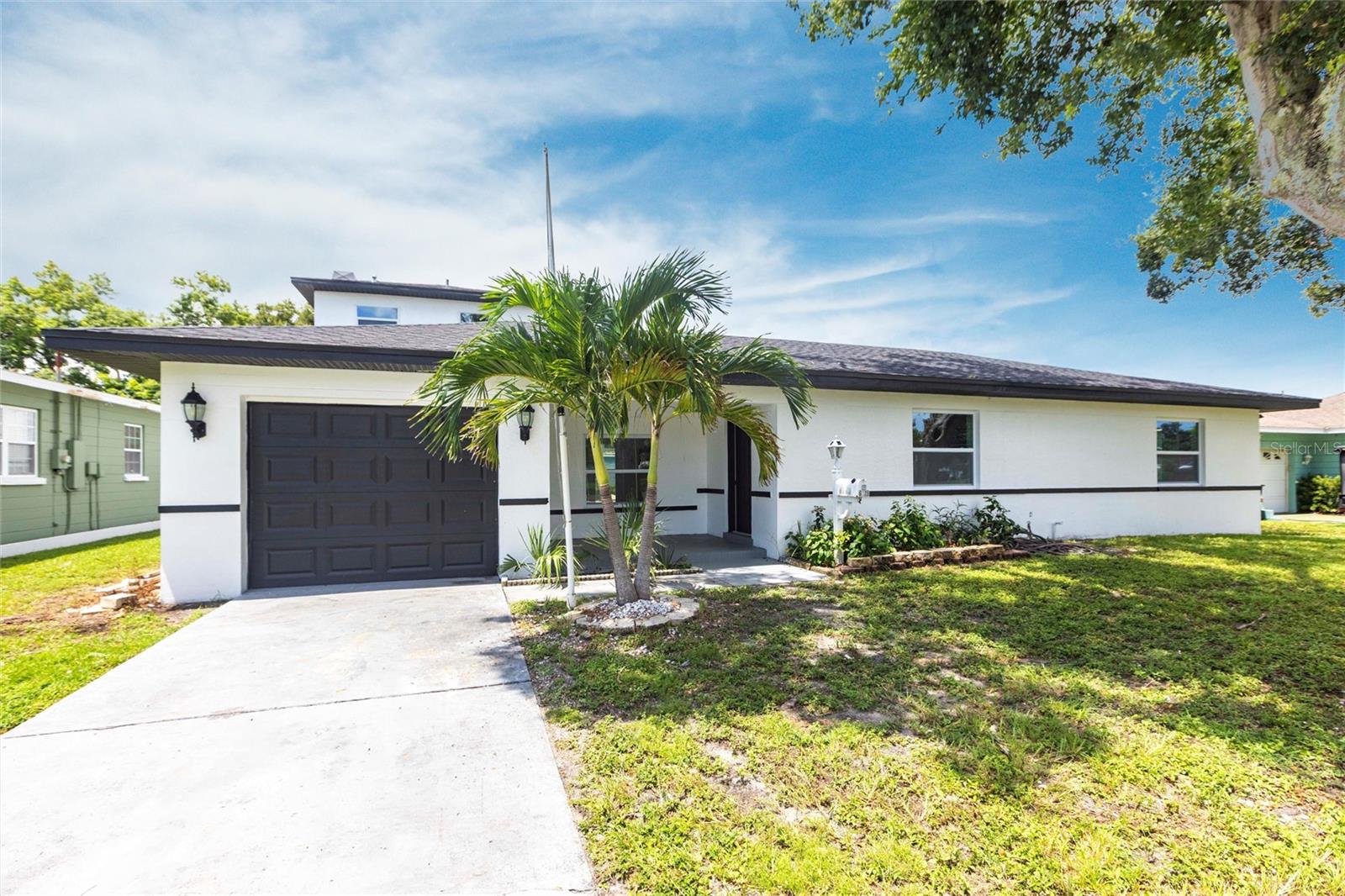 Welcome to 6119 19th Ave N—where classic Florida charm meets everyday comfort. Nestled in a quiet, established neighborhood in northwest St. Petersburg, this spacious 3-bedroom, 2.5-bathroom recently renovated pool home offers nearly 2,000 square feet of living space on a generously sized lot. From the moment you arrive, you’ll notice the well-maintained curb appeal and timeless character of this 1950s gem.
The living and dining areas are ideal for entertaining, The updated kitchen with quartz countertops and stainless steel appliances boasts ample cabinet space, natural light, and a perfect flow. This home features a brand NEW AC CONDENSER (2025) NEW ROOF (2025) NEW TANKLESS WATER TANK (2025), NEW POOL EQUIPMENT (2025) and luxury vinyl flooring throughout.
All three bedrooms are spacious, calming, and thoughtfully positioned for privacy. The primary suite is spacious and private, with an en-suite bath and room for a king-size bed. Two additional bedrooms on the main level offer flexibility for a growing family, home office, or guest space. A convenient half-bath off the living space is ideal for entertaining.
Imagine cooling off in the heat of a summer afternoon with a gentle swim, weekend parties where music plays and everyone gathers, or simply floating in silence. This pool doesn’t just add value — it adds peace, pleasure, and connection to everyday living.
Location, Location, Location!
Positioned just minutes from Tyrone Square Mall, Walter Fuller Park, and the popular Pinellas Trail, you’re a short drive from downtown St. Pete, Treasure Island, and St. Pete Beach. Easy access to shopping, top schools, dining, and recreation make this a smart choice for anyone seeking the Florida lifestyle.
Whether you're a first-time buyer, relocating, or looking for a rental investment, this home checks all the boxes—spacious, move-in ready, and located in a high-demand area with strong property value growth.
Don’t miss your chance to own this piece of St. Pete paradise—schedule your showing today!