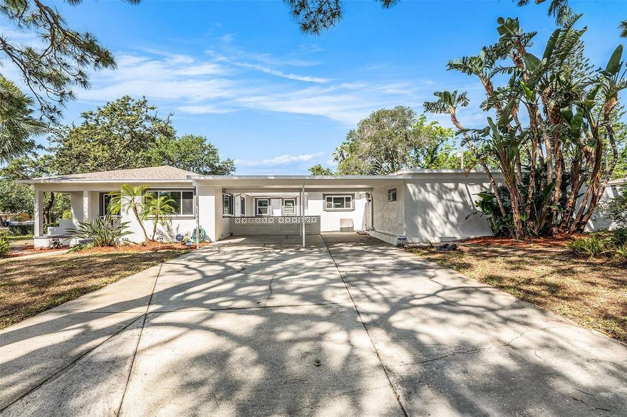 Welcome to 4925 Alcazar Way South, a beautifully maintained residence in the desirable Lakewood Estates neighborhood. Situated on a spacious corner lot, this charming 3-bedroom, 2-bath home offers a perfect blend of comfort, functionality, and Florida lifestyle.

Inside, the thoughtfully designed floor plan features a generous primary suite with a private ensuite bathroom and ample space for a king-size bed. Two additional bedrooms showcase original hardwood floors and timeless character. A conveniently located laundry room adjacent to the primary suite adds everyday practicality.

Step outside to your private backyard oasis. A screened-in patio leads to a sparkling pool and hot tub, complemented by an outdoor kitchen with sink and prep area, outdoor shower, composite decking, and retractable sunshades—ideal for entertaining or relaxing year-round.

A versatile 420-sqft detached workshop provides endless possibilities, whether used as a creative studio, workspace, or guest retreat. Additional highlights include a dedicated generator station with propane hookup, a 2024 roof with transferable warranty, updated AC (2019), and a clean 4-point inspection for added peace of mind.

Conveniently located near I-275, downtown St. Petersburg, beaches, parks, and boat ramps, this property offers the best of Florida living with exceptional accessibility. Don’t miss the opportunity to make this special property your own.