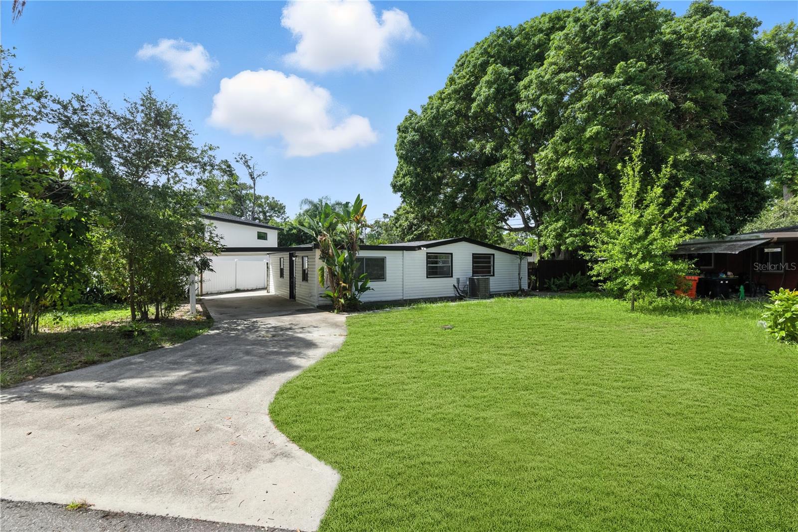 Charming and fully renovated in a prime South Pasadena location. This 3-bedroom, 1-bath home has been thoughtfully updated from top to bottom with a brand new roof, HVAC, kitchen, bathroom, and more. Clean finishes and a fresh, modern feel throughout make this home move-in ready and perfect for easy everyday living. Located in unincorporated Pinellas County, it also offers investment potential with fewer restrictions and added flexibility. Step inside to an open-concept living and dining space filled with natural light. The brand-new kitchen blends style and function, and a versatile third bedroom just off the kitchen offers access to the backyard—ideal for guests, a home office, or creative space. The two additional bedrooms are located off the main living area, with a remodeled hall bathroom that also connects privately to the primary bedroom. Outside, a covered carport offers convenient parking, and the backyard is a blank canvas for your outdoor ideas—think morning coffee, a garden nook, or casual weekend hangouts. All just minutes from the beach (less than 2 miles), downtown Gulfport, and under 5 miles to the heart of St. Pete. Whether you're starting out, downsizing, or investing, this home offers comfort, style, and a location that’s hard to beat.