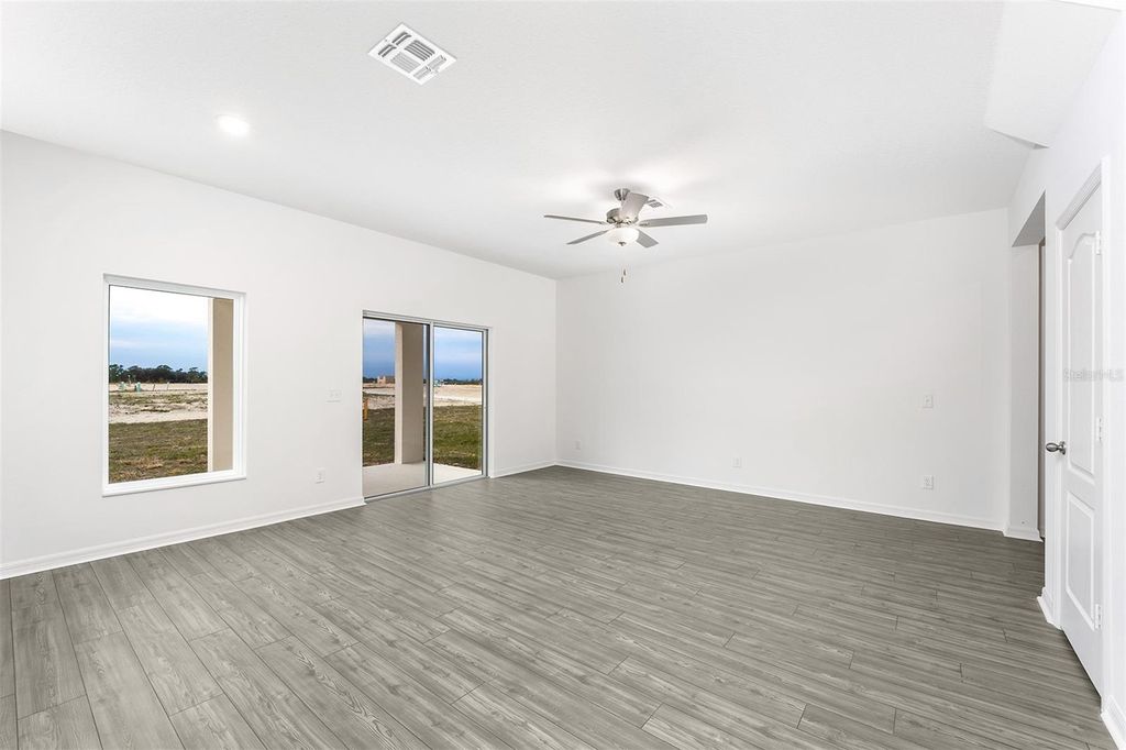 Photo of 3712 Bergamot Street, Lake Alfred, FL 33850 (MLS # TB8403872)