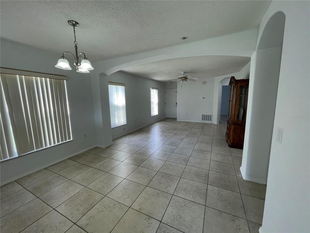Photo of 13415 Fairway Glen Drive #104, Orlando, FL 32824 (MLS # S5133135)