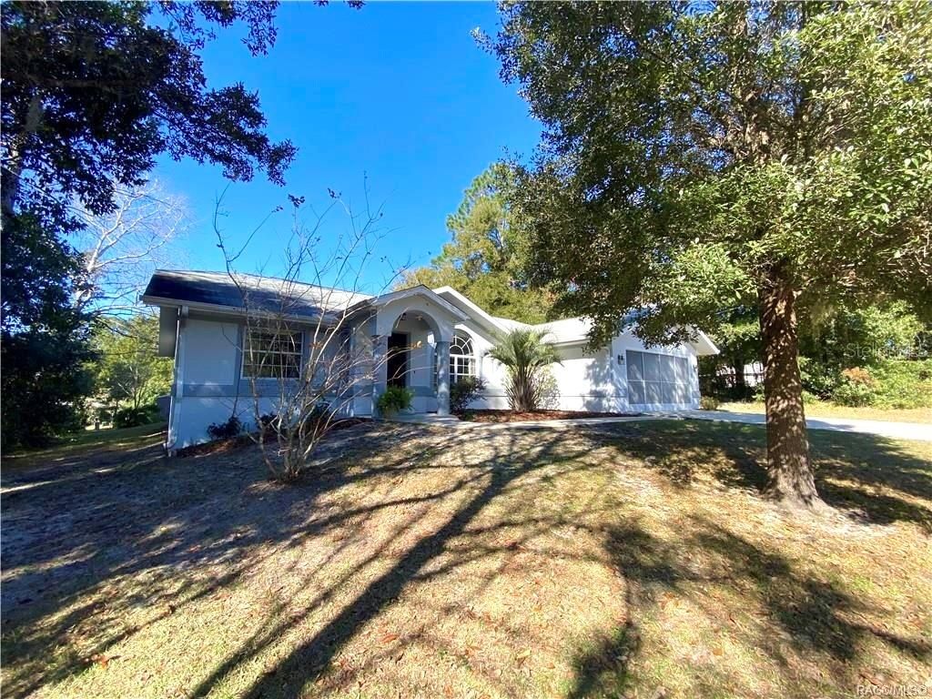 Photo of 8272 Pocono Dr, Citrus Springs, FL 34434 (MLS # OM715414)