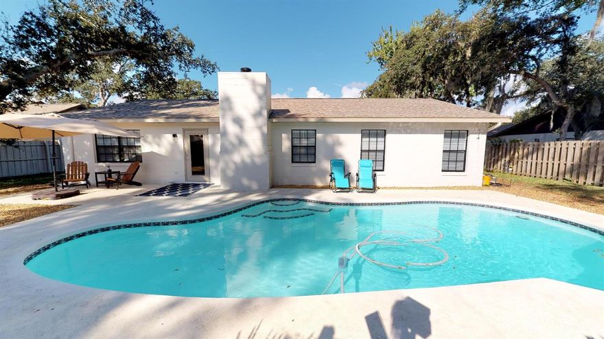 UPDATED IN STYLE! You're going to fall in love with this completely updated 3 BR/2 Bath Pool Home! Brand NEW: Kitchen with SS Appliances, Baths, Flooring, Blinds throughout, ROOF, A/C, Washer/Dryer, Electric Panel, 2-Car Garage Door, Pool Pump - Filter & Skimmer, Irrigation Pump, Fresh Paint Inside & Out. What did we miss... Nothing! Sunlit Open Concept with High Ceiling and Fireplace. Double Gates on both sides of house for RV or Boat Parking. Party or Relax on the Large Pool Deck (41 x 24 & 11 x 10). The Yard is completely Privacy Fenced with Irrigation System on Private Well. Spacious Garage (18.8 W x 22 D). This Spectacular Home and Sparkling Pool are perfect for entertaining or for enjoying the FL Lifestyle ... In Style ... Everyday! Desired location in Deep Forest Village Subdivision, close to shopping and A Rated Schools! Owners career move gives you the perfect opportunity to Make this Beautiful Home Yours! ;Water: City