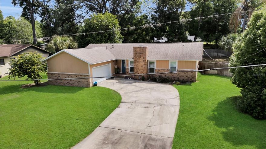 Located in a desirable southeast location, this beautifully renovated and spacious home is truly move-in ready. From the moment you step inside, you’ll appreciate the open feel, highlighted by cathedral ceilings, recessed lighting, and stylish gray vinyl flooring that flows seamlessly throughout the home. All ceiling fans and light fixtures are included, adding even more value and convenience.

The inviting living area features a modern electric fireplace, perfect for relaxing evenings, and opens effortlessly into the dining space—creating an ideal layout for both everyday living and entertaining. French doors lead to a large glass-enclosed flex room, perfect for a game room, home office, den, or additional sitting area to suit your needs.

The kitchen has been tastefully updated with renovated cabinetry, beautiful granite countertops, and a sleek tiled backsplash. With ample prep space and a pantry for extra storage, it offers both functionality and style. All appliances are newer, including a gas stove, dishwasher, microwave, washer, and dryer.

The spacious primary suite provides a comfortable retreat with a walk-in closet and private en suite bath. Two of the additional bedrooms feature double closets, offering excellent storage and flexibility. The home also includes a convenient indoor laundry room. Major updates, including the roof and AC (2019), provide added peace of mind.

Step outside to a generously sized, fully fenced yard filled with beautiful trees that create a quaint, peaceful setting. Whether you’re enjoying a quiet morning coffee under the shade or hosting friends and family, this outdoor space offers the perfect backdrop. The fire pit adds a fun and inviting touch.

Conveniently located just minutes from shopping, dining, medical facilities, and entertainment, this home combines comfort, updates, and location.

Beautifully updated and impressive from the moment you enter...this is one you don’t want to miss.