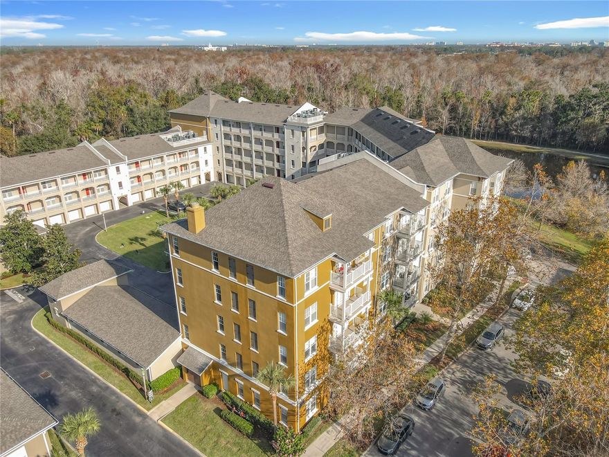 Available NOW in Celebration, Florida!  A condominium residence providing lifestyle ease with amenities close at hand.  There's a pool and fitness center and neighborhoods flanked by green space and ponds.  Nearby are coffee shops, restaurants, grocery stores, movie theatres, a post office, parks and walking trails.  Unit #408 is assigned a 1-car garage bay, G-41. A 4th floor residence, the foyer opens into an entry hall and to the dining room.  The footprint then flows seamlessly into the kitchen, which has amply cabinetry, solid surface countertops and a built-in desk area.  In addition, there is a generous pass through into the living room, allowing for conversation while entertaining guests.  French doors line the far wall of the living room and provide both exterior views, natural light and access to the covered balcony.  The primary bedroom boasts a generous walk-in closet and en-suite bath with dual vanity sinks and a separate tub and shower.  Additionally, this unique floor plan allows each bedroom its own privacy.  Bedroom 2 is located in a separate hall enclave that houses the laundry room and 1/2 bathroom.  Bedroom 3 hall enclave has a full bathroom with tub/shower combination and a walk-in closet.  Property is sold As-Is.  Buyer and/or buyer's agent responsible for verifying all pertinent information deemed relevant by the prospective buyer, including but not limited to square footage, acreage, utilities, taxes, zoning, permitting, condition, school zones, HOAs, etc..