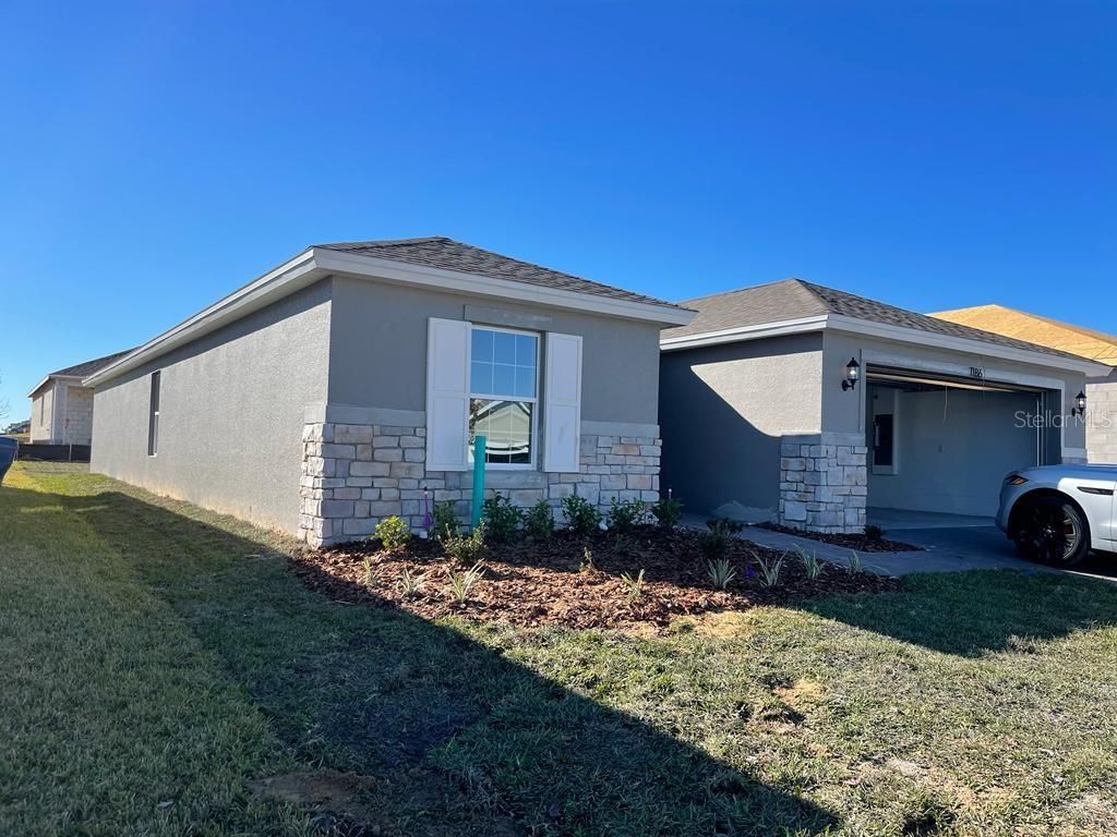 Photo of 1186 Tupelo Trail, Haines City, FL 33844 (MLS # O6406847)