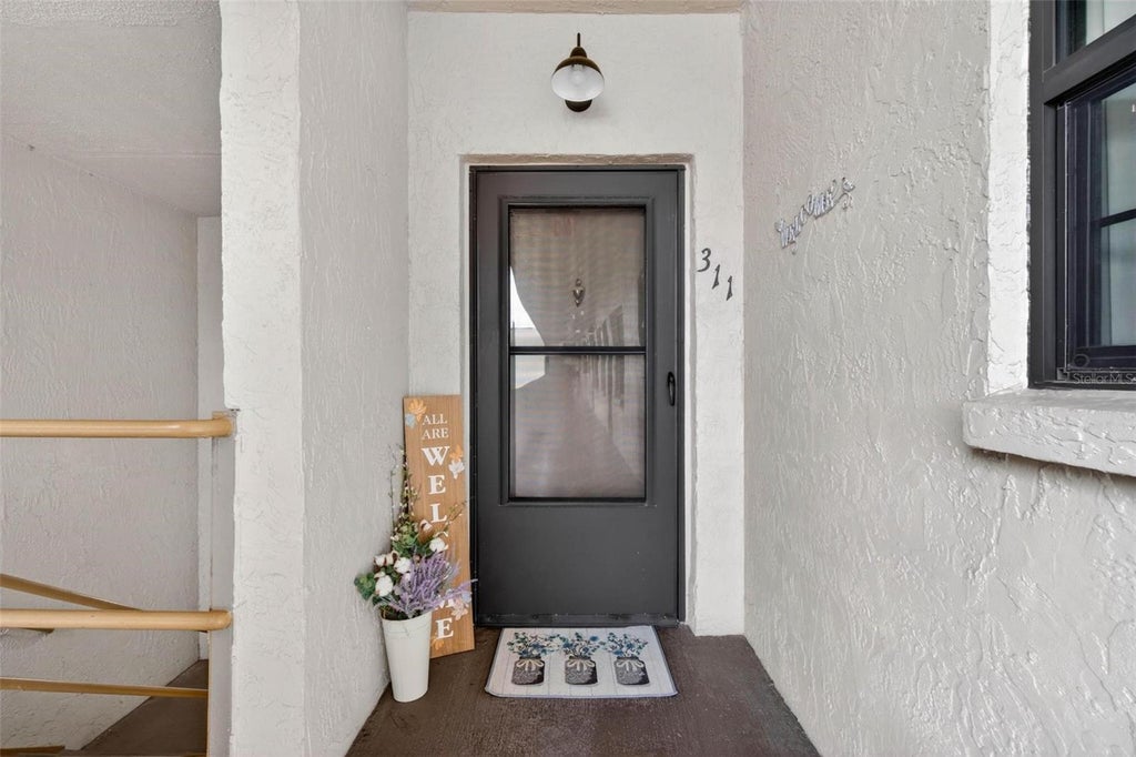 Photo of 5975 Terrace Park Drive N #311, St Petersburg, FL 33709 (MLS # TB8518432)
