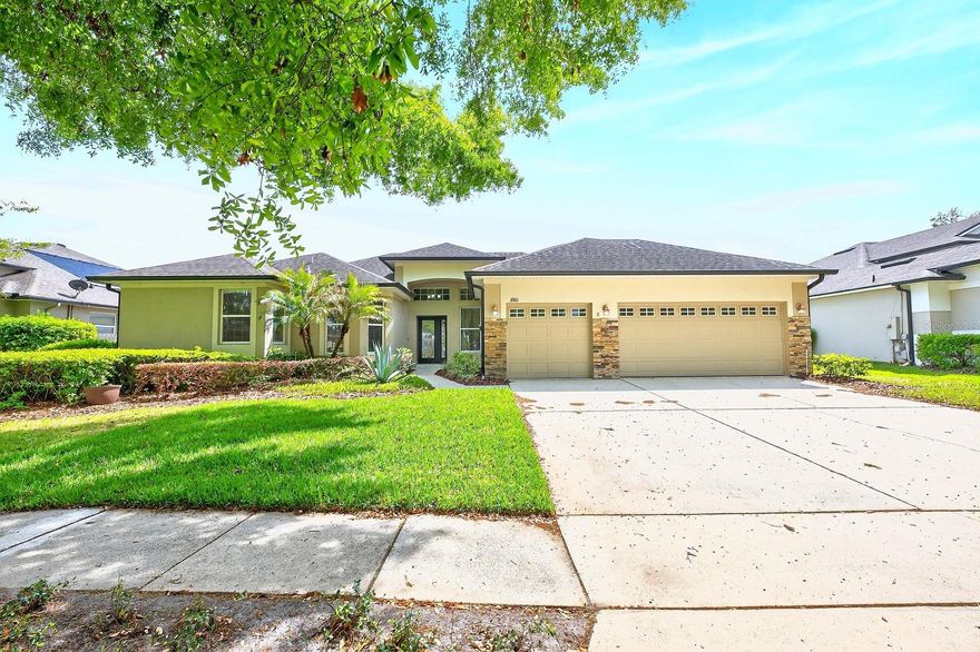 One or more photo(s) has been virtually staged. Seller may consider buyer concessions if made in an offer**Welcome to this spectacular pool home in the GATED COMMUNITY of Emerald Estates in Apopka, where elegance, space, and thoughtful upgrades come together across nearly 3,000 SQUARE FEET of beautifully designed living space. Situated on an OVERSIZED LOT with meticulously manicured landscaping, this residence offers exceptional curb appeal, highlighted by STONE ACCENTS framing the THREE-CAR GARAGE. Step through the ELEGANT GLASS-PANELED FRONT DOOR into a light-filled Living Room with soaring ceilings, where expansive sliding doors immediately draw your eye to the STUNNING BACKYARD RETREAT.  An arched doorway adds ARCHITECTURAL CHARM as you enter the chef’s kitchen featuring 42” cabinetry, granite countertops, a stylish tile backsplash, ALL-NEW STAINLESS STEEL APPLIANCES and GARBAGE DISPOSAL (2025), and a spacious breakfast bar. A CUSTOM OVERSIZED PANTRY ROOM (added in 2023) provides exceptional storage, while the SUNLIT Dining area with multiple windows and sliding doors creates a seamless connection to the outdoor living space. The Kitchen flows effortlessly into the EXPANSIVE FAMILY ROOM, where large windows frame serene views of the pool and patio. DURABLE CERAMIC TILE FLOORING enhances both the Kitchen and Family Room for easy maintenance and timeless style. The Primary Suite is a TRUE RETREAT featuring tray ceilings, abundant natural light, a walk-in closet, and PRIVATE ACCESS to the patio and pool area. The SPA-INSPIRED EN SUITE BATH offers dual vanities connected by a dedicated makeup area, a garden tub, a step-in shower, and a private water closet. A VERSATILE OFFICE is ideally positioned nearby and can easily serve as a fifth bedroom. On the opposite side of the home, three additional generously-sized bedrooms provide comfortable accommodations, including two connected by an UPDATED JACK-AND-JILL BATH (2023), while a third full bath offers convenient access to both guests and the pool area. Upstairs, a SPACIOUS LOFT provides flexible living space perfect for a media room, game room, or additional lounge. Step outside to your private BACKYARD PARADISE, where a covered paver patio with dual ceiling fans and a FULLY EQUIPPED OUTDOOR KITCHEN overlooks a sparkling pool and spa, all enclosed within a screened lanai. The pool area has been resurfaced (2023) and boasts a NEW PUMP (2023) and UPDATED CONTROLLER (2025), offering both beauty and efficiency. Beyond the lanai, the expansive VINYL-FENCED YARD (2025) features an additional patio with a GRILL AND FIRE PIT (2023)—perfect for entertaining under the stars. Additional updates include a NEW GARAGE DOOR OPENER (2025), NEW WATER HEATER (2025), NEW CARPET (2026), and NEW AC SYSTEMS (downstairs 2022, upstairs 2024), ensuring comfort and peace of mind. Residents of Emerald Estates enjoy GATED ACCESS, a playground, and tennis courts, all within a serene and well-maintained community. Ideally located near the natural beauty of WEKIWA SPRINGS STATE PARK, as well as shopping, dining, and entertainment in APOPKA and nearby ALTAMONTE SPRINGS, this home also offers CONVENIENT ACCESS to major roadways like State Road 429 for an EASY COMMUTE throughout Central Florida. This exceptional home provides a refined combination of luxury, comfort, and RESORT-STYLE OUTDOOR LIVING—truly a place to experience the BEST OF FLORIDA LIVING every day. Call and schedule your tour today!