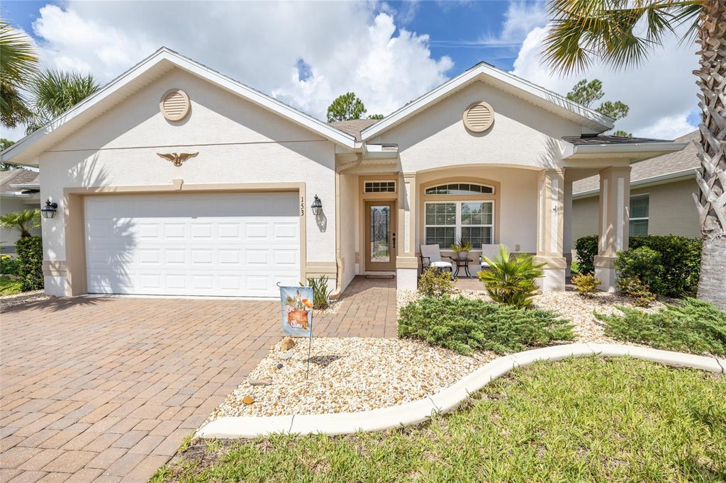 Photo of 153 Park Place Circle, Palm Coast, FL 32164 (MLS # FC320522)