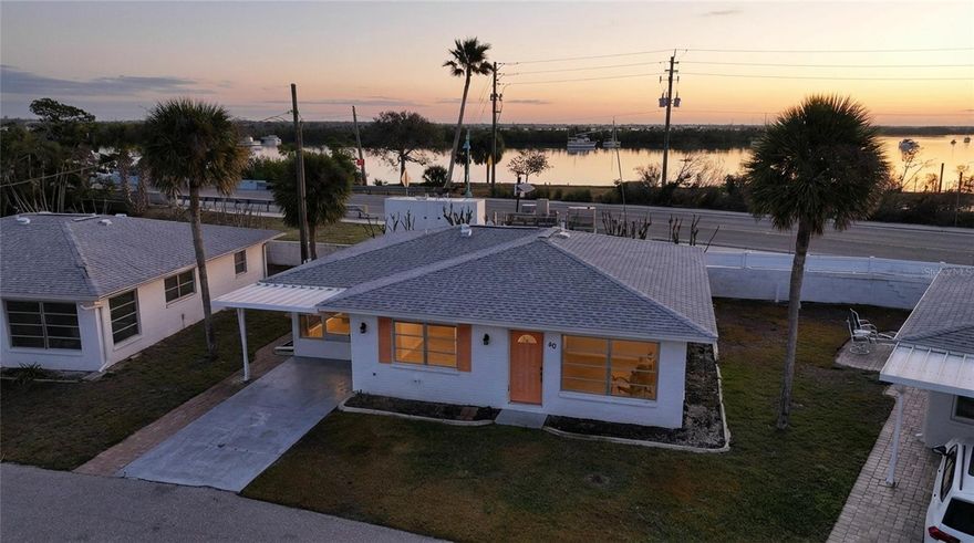 One or more photo(s) has been virtually staged. Discover the potential of this charming 2-bedroom, 2-bathroom detached villa offering the perfect opportunity to create your own coastal retreat. Located within a desirable 55+ community in Englewood, Florida, this property is truly a designer’s dream—a blank canvas ready for your personal style, finishes, and vision to come to life.

The living and dining areas provide an open, inviting layout filled with natural light, ideal for reimagining a modern coastal aesthetic or comfortable beachside getaway. The kitchen footprint offers ample room for redesign, whether you envision sleek contemporary cabinetry or a light, beach-inspired refresh. Both bedrooms are generously sized, with the primary suite featuring an en-suite bathroom for added privacy and convenience.

A covered carport adds everyday practicality, while the detached villa design offers added privacy and the feel of single-family living with low-maintenance ease—perfect for seasonal or year-round enjoyment.

Residents enjoy access to a community pool, providing the perfect place to relax, socialize, and soak up the Florida sunshine.

Location is everything—and this one delivers. Situated directly across the road from Englewood Beach on Manasota Key, you’re just steps from the sand, Gulf breezes, and breathtaking sunsets. Enjoy the convenience of walking to several popular beachfront restaurants, tiki bars, and island dining spots, making every day feel like a vacation.

Whether you’re searching for a seasonal home, winter retreat, investment opportunity, or low-maintenance home near the beach, this property offers incredible upside potential in an unbeatable Southwest Florida beach location. Bring your creativity and transform this space into the coastal haven you’ve always envisioned.