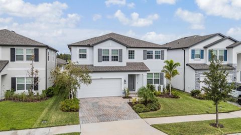 Photo of 33181 Rosewood Bark Way, Wesley Chapel, FL 33545 (MLS # TB8429106)