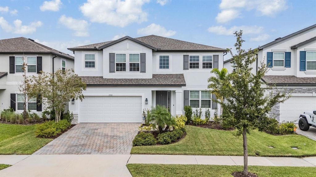 Photo of 33181 Rosewood Bark Way, Wesley Chapel, FL 33545 (MLS # TB8429106)