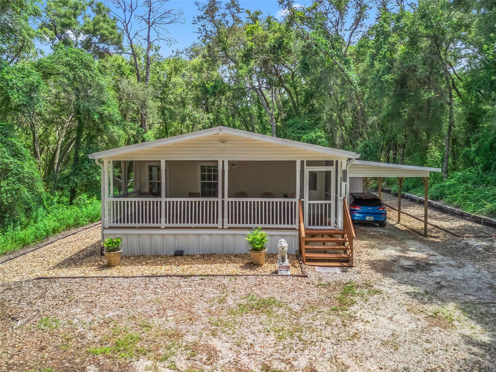 Welcome Home to Your Peaceful Country Retreat—Just Minutes from The Villages!
Enjoy the best of both worlds with this charming home that offers serene country living while being conveniently close to all the amenities the city has to offer. All major mechanical systems are in great condition, and the roof was replaced in 2022!
As you approach the home, you're welcomed by a spacious screened-in front porch with beautiful wood flooring—perfect for relaxing or entertaining while surrounded by nature and peaceful views.
Step inside to a warm and inviting kitchen, designed with an open-concept layout that flows seamlessly into the dining area and L-shaped living room, making the space ideal for gatherings and everyday living.
This well-maintained home features:
Two generously sized bedrooms
Two well-appointed bathrooms
A separate indoor laundry room
A solid, well-built carport
An outdoor storage shed located at the back of the property
The optional furniture can remain with the home and is negotiable at the time of offer.
A unique feature of the property is the heavy-duty fenced perimeter, complete with a cattle gate at the entrance—perfect for keeping your furry friends safe while allowing easy access in and out.
Located just minutes from The Villages, as well as doctors’ offices, pharmacies, restaurants, retail stores, specialty shops, and more, this home offers both comfort and convenience.
Ask your Realtor for more information about this wonderful area and come experience the best of Florida living!