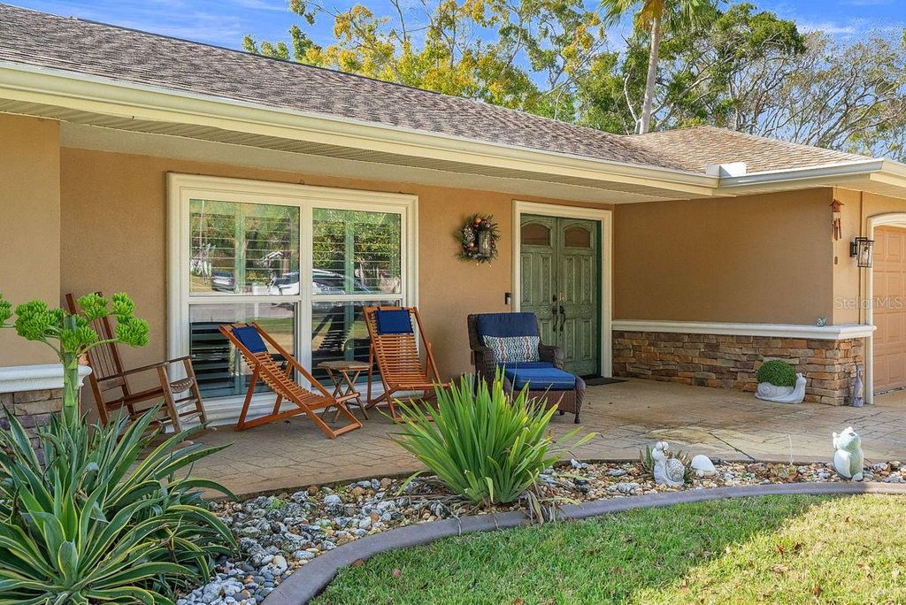 Photo of 1205 Royal Oak Drive S, Dunedin, FL 34698 (MLS # TB8458283)