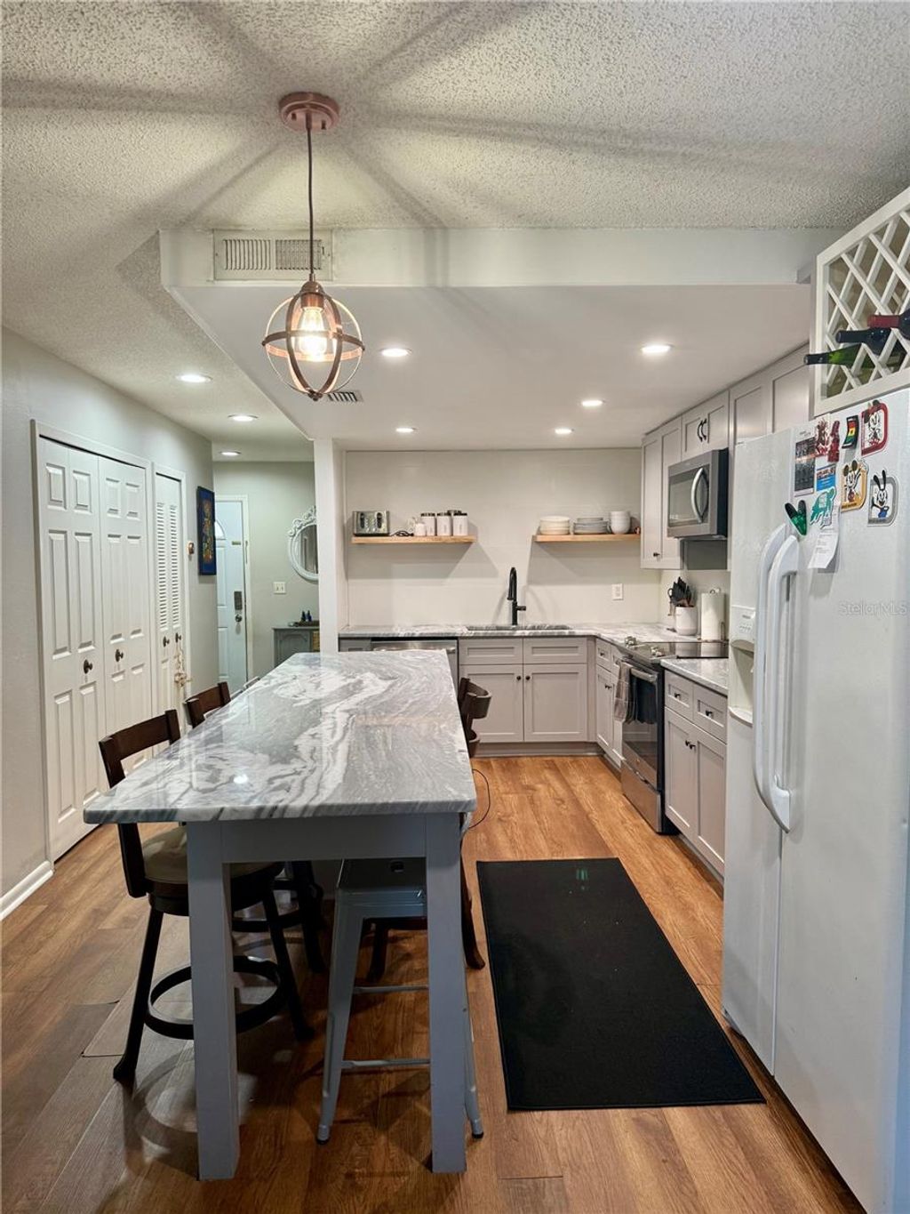 Photo of 1920 Whitney Way, Clearwater, FL 33760 (MLS # L4955866)