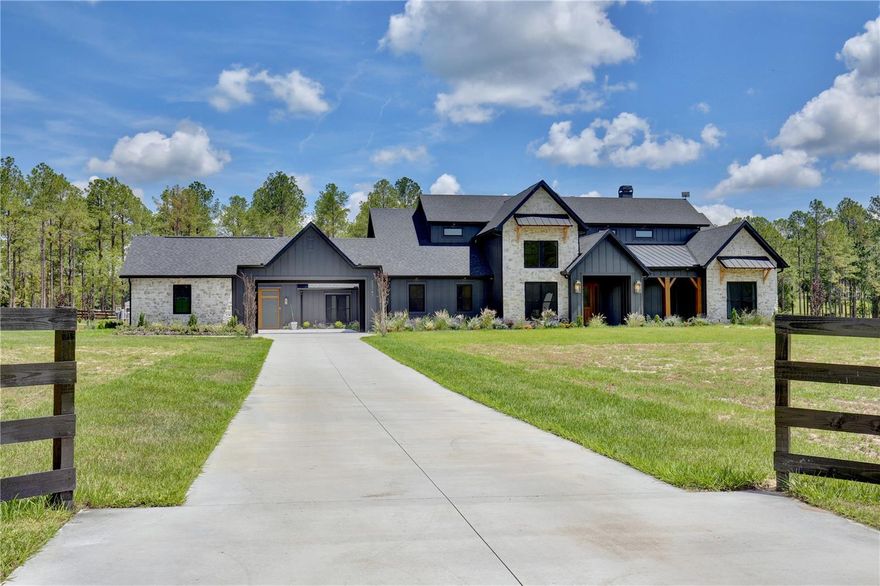 Bring your horses to this quiet high-end community and enjoy an original Hagedorn custom home masterpiece! With eye catching details that make you feel like you are looking at a page in a storybook! Sky high roof top peaks surrounded by picturesque windows makes this home one you can only dream of! The beauty on the outside only multiplies the moment you walk into the door. Providing nearly the perfect floor plan with just the right amount of open airy space yet still having dedicated living areas. Remarkable craftmanship can be found in every inch of this home and the amount of thought into each detail is profound and a must see! Carefully thought-out laundry room with dog wash station, whole room pantry with deep freezer and stunning cabinet area! Only the best, top quality fixtures throughout! The kitchen boasts loads of counter and cabinet space, and top-quality matching WOLF appliances! All outlined by beautifully crafted under cabinet lighting and pop-up charging stations! This home features loads of energy efficient and "smart home" upgrades including but not limited to whole home spray foam insulation, and double paned windows in every room and a whole home Ring floodlight system! Enjoy the evenings relaxing on the large covered back patio listening to the whole home SONOS speaker system, overlooking your more than 5 acres of beautiful equestrian landscape.  There is not enough space to list all of the features this home has to offer and the charming characteristics that set it apart from any other home! Schedule you're showing today, this one will not last long! **SUB-Zero Wolf Refrigerator has been ordered and will be a part of the sale** Room Feature: Linen Closet In Bath (Primary Bedroom).