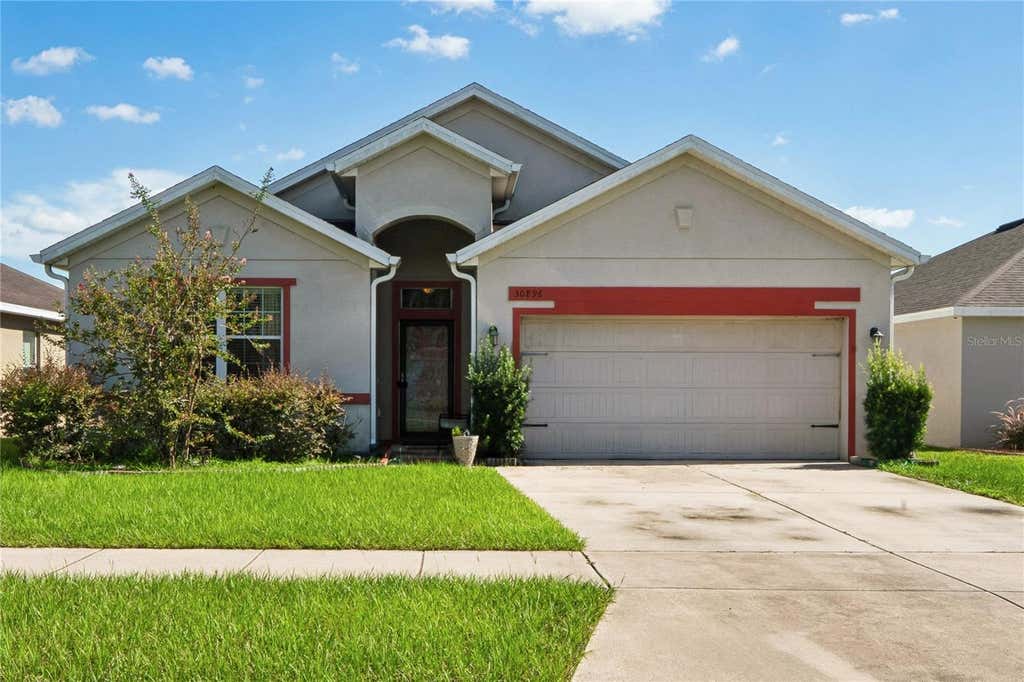 Photo of 30896 Satinleaf Run, Brooksville, FL 34602 (MLS # W7888424)