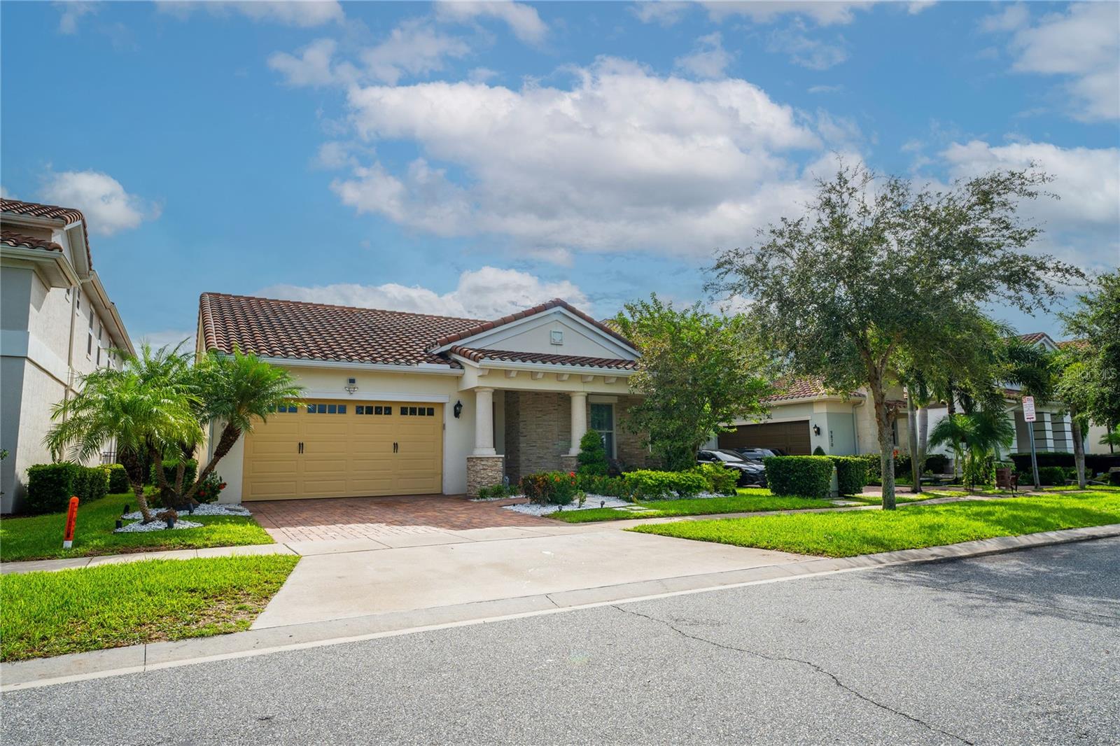 DISCOVER your dream single family home in the exceptional Gated Eagle Creek Village community at Lake Nona, Orlando. Stunning home 4 bedrooms and 3 bathrooms, private swimming pool and jacuzzi, 2 car garage, spacious and elegant living spaces, gourmet kitchen and ample counter tops. RESORT-STYLE amenities as seven playgrounds, gazebos and pavillions ponds view, family recreational center with fitness and meeting rooms, Tennis, Pickleball and Basketball courts, multi purpose atlhetic fields, dog park, walking trail, pools , splash and sundeck, a World-Class Golf course, golf clubhouse with shopping and restaurant. ACCROSS from Lake Nona Middle and High Schools , minutes close to Medical City Hospitals and Offices, VA Medical Center, United States Tennis Association's National Campus, Orlando International Airport. A short drive to Walt Disney World and Universal Studios. Easy access to Lake Nona Town Center, shopping centers, supermarkets and restaurants. Pool mantainance and landscaping is included. This opportunity won't last. Secure your place in this vibrant community!.