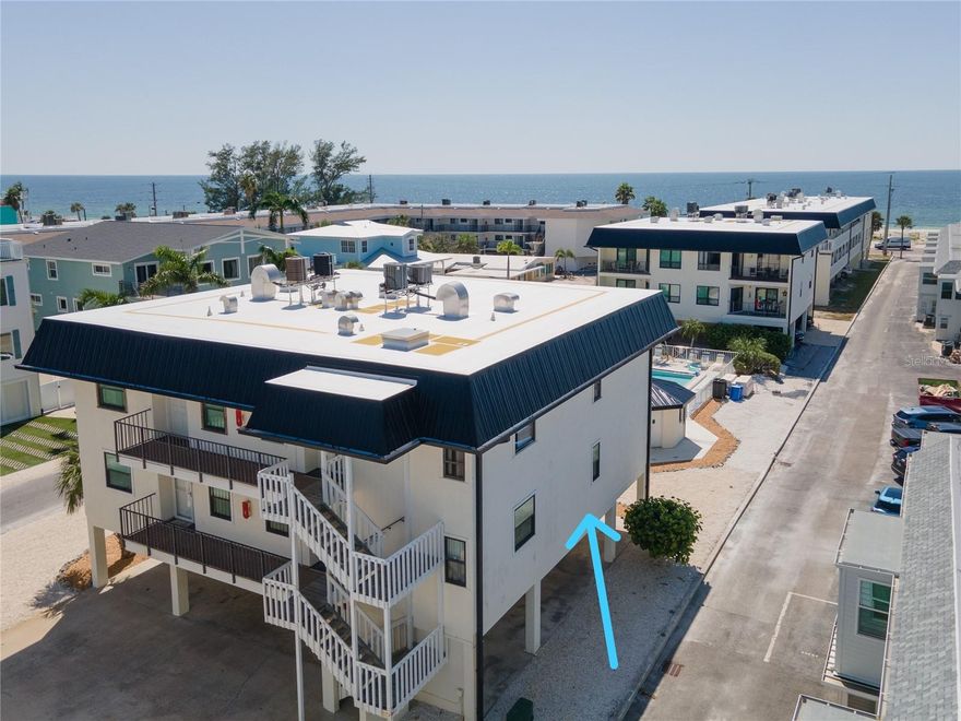 Located just steps to both the GULF and BAY with beach views from this great 2 BR/2 BT condo.  This preferred location (between the Bridges) offers easy access on & off the island and is in close proximity to all the best Anna Maria Island has to offer... Just a short stroll to Historic Bridge Street with great dining, entertainment, shops, and the Historic Bridge Street Pier where the first wooden bridge to AMI was once long ago... This unit offers good, natural lighting and water views from the living room, primary bedroom and lanai- perfect for taking in the beach sunsets. Gulf Watch units are elevated & sustained no flood damage from last year's hurricanes. This beach-to-bay complex allows weekly rentals to offset expenses, a private, heated pool and assigned covered parking for each unit. Unit #109 comes with turn-key furnishings, newer hurricane impact rated doors & windows and is ready for you to make your own!