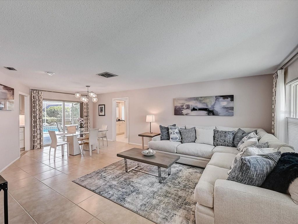 Photo of 10 Stone Mountain Boulevard, Englewood, FL 34223 (MLS # A4676254)