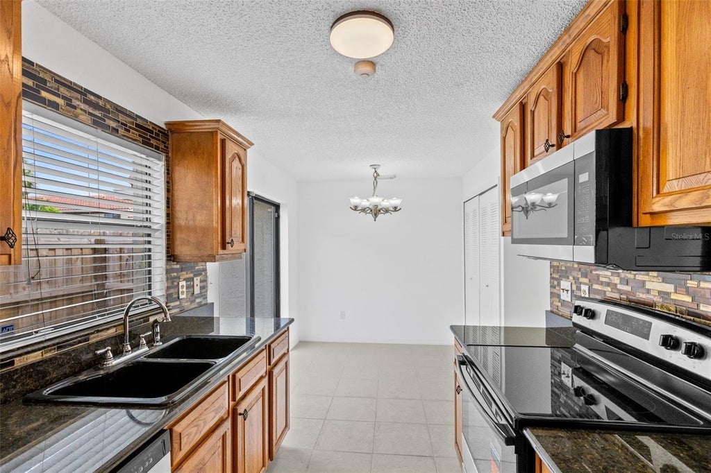 Photo of 6267 Whispering Way #119, Orlando, FL 32807 (MLS # TB8555514)