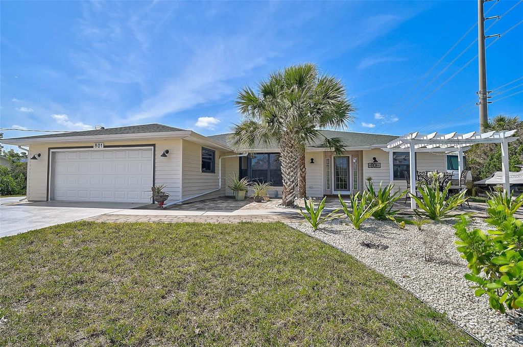 Photo of 801 E 5th Street, Englewood, FL 34223 (MLS # A4650000)