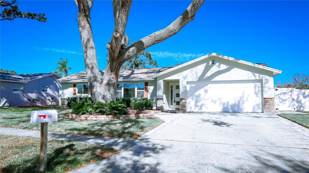 Photo of 12911 91st Avenue, Seminole, FL 33776 (MLS # TB8452316)