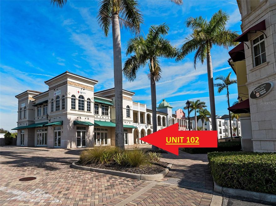 NOW $449,000! Big Price Improvement!  Seller is ready to make a deal!  EXCEPTIONAL OPPORTUNITY to OWN & GROW YOUR BUSINESS in an UP-SCALE WATERFRONT WALKING COMMUNITY! First-floor retail-office condominium in the highly regarded Bay Street Commercial Condominium, located in Osprey’s Bayfront Village—one of Sarasota County’s fastest-growing waterfront walking communities. This turn-key, beautifully built-out space is designed to accommodate a wide range of professional uses, including medical, professional services, retail, and boutique office operations. Perfectly positioned for long-term success, the property is set to benefit from significant foot traffic, with approximately 252 luxury multifamily apartment residences currently developed directly behind the town center. The location is further enhanced by close proximity to affluent communities such as The Oaks and nearby luxury bayfront estates, all just minutes away. Inside, the meticulously designed layout features soaring ceilings that create a refined sense of openness and sophistication. No expense was spared in the high-end build-out, with substantial investment dedicated to crafting a luxurious, private, and highly functional professional environment. The thoughtfully designed floor plan includes six private offices, two conference rooms, a bright, professionally appointed lobby with a welcoming reception area, two well-appointed bathrooms, and a convenient kitchenette. Each office is constructed with soundproofed walls and solid hardwood doors, ensuring privacy, comfort, and quiet productivity. Upscale lighting, premium flooring, and modern finishes elevate the space throughout, reinforcing its contemporary, high-end appeal. A rear door provides direct access to ample employee parking, offering convenience and ease for staff. The property also features a charming front porch that may serve as a welcoming seating area with potted plants, a coffee table, and comfortable seating, creating a warm and inviting, home-like first impression for clients, patients, or guests. Ideal for medical, professional, or boutique office use, this property presents a rare opportunity to establish or expand your business within a high-end commercial complex poised for continued growth and long-term value. See attached Feature Lists for additional details about the community and Unit 201.