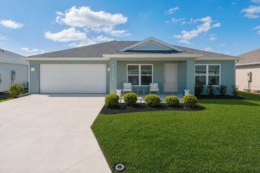 Located in the desirable Village of Shady Brook, near Eastport; this Gilcrest model home has been upgraded to feature a brand new 12’x20’ stunning gas-heated pool, set within a white screened lanai complete with decorative fountains and a spacious sundeck for your enjoyment. There is a covered area for shade, as well as a large, uncovered patio, perfect for entertaining large groups. 

You will walk into the spacious open floor plan of the living room, dining room and eat-in kitchen, equipped with custom lighting and multiple skylights for ample sunlight. The master bedroom features a private tile walk-in shower with glass door and a quartz-top vanity with drawers for storage. The walk-in closet has additional shelves added for maximum organization. The other side of the house features two bedrooms with ample double-door closet space and a guest bathroom with tub/shower combo and tile on the walls. 

There is a separate laundry room as you head out towards the two-car garage, where you will notice a water softener has been added already for your convenience. The front door keypad has been upgraded for ease of monitoring remotely. Various light fixtures have been upgraded throughout; blinds have been installed, gutters have been added, landscaping updated with a Sylvester palm tree and more! With the right offer, this home conveys fully furnished — including the 75" television, artwork, small appliances, and everyday essentials. Truly move-in ready.

The location is unbeatable. Eastport Town Center is just over a mile away, and Sawgrass Grove — with live nightly entertainment, the Show Kitchen, and Villages Grown market — is a short golf cart ride away. Golfers are minutes from both Southern Oaks Championship Golf Course and Laurel Oak Executive Course. Ezell Recreation Center is just up the road, with the growing Middleton area just south.

Home was newly constructed in 2024. Public water and sewer. No history of water intrusion, flooding, or insurance claims. Pool enclosure meets all Florida barrier requirements. See the Sellers Disclosure for further details on upgrades. The Villages is a 55+ community. See their website for details regarding occupancy and restrictions.