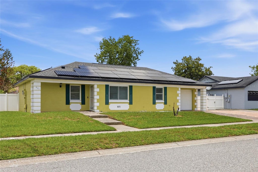 Photo of 931 Arizona Woods Lane, Orlando, FL 32824 (MLS # O6423517)