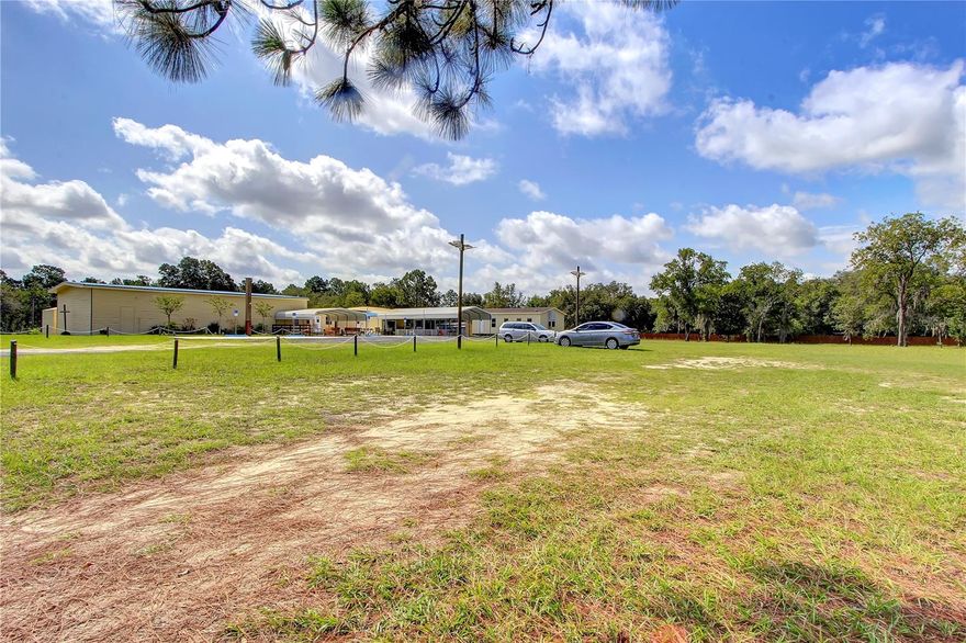 AWESOME PROPERTY. PERFECT FOR YOUR GROWING WORSHIP CENTER OR ASSEMBLY! Special Use permit has allowed this 2.9 acre parcel to house a PLACE OF WORSHIP since 1984. Other Permitted or Special Uses include Greenhouse/Plant Nursery, Ornamental Horticulture & Nursery Products- Retail/Wholesale, School or Nursery School, Veterinary Office/Clinic, etc. See attachment or contact Marion County for complete list. Zoning- Rural A1, Property includes 1860 SF Metal Clear Span Building w central AC (1457 SF Sanctuary w stage, 2 remodeled 1/2 bathrooms, foyer with Sound Booth/Greeting Station), 2 Outside Storage Sheds, Detached 16x10 office, Separate 28x14 Building with bathroom being used for Youth Ministry. Fourth portable, on site but not hooked up, is NOT included in this sale. Mechanical, Electrical, Plumbing brought to code in 2021, 2 Lennox 14 SEER ACs- 2021, 7 Camera Security System conveys, Solar Safety Street Lights, Parking 45+, 4 Handicap Spaces, Fenced, County Maintained Road. CHECK OUT THE VIDEO... THEN TAKE ADVANTAGE OF THIS AWESOME OPPORTUNITY!