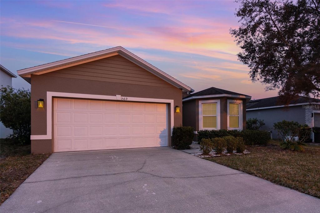 Photo of 1569 Tamarind Road, Davenport, FL 33896 (MLS # O6377767)