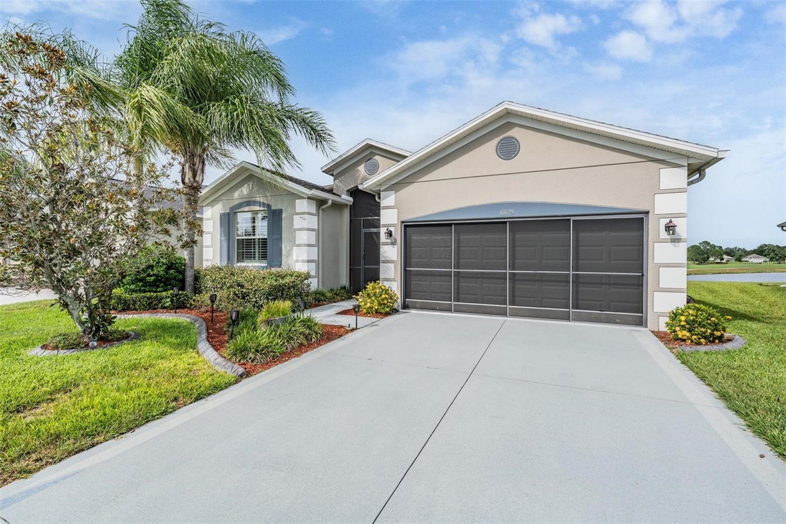 Welcome to 10029 Semiahmoo Loop – Your Florida Lifestyle Awaits! Step into this beautifully maintained one-story home nestled in the sought after 55+ gated community of Tampa Bay Golf and Country Club in San Antonio, Florida. With 3 spacious bedrooms, 2 full bathrooms, and an inviting open floor plan, this home was thoughtfully designed for both comfortable living and effortless entertaining.
As you enter, you’re greeted by warm luxury vinyl plank flooring that flows throughout the main living areas, creating a seamless and stylish foundation. The heart of the home is the open-concept living and dining space, filled with natural light and perfect for gatherings with family and friends. The eat-in kitchen is a dream come true offering granite countertops, abundant cabinetry, and plenty of prep space. Whether you're enjoying your morning coffee by or hosting a dinner party, this kitchen is both functional and charming.
The spacious owner’s suite offers a peaceful retreat with views of the pond and golf course, a large walk-in closet, and an en-suite bath. The additional bedrooms are ideal for guests, hobbies, or a home office, providing flexibility to fit your lifestyle. Step outside to the star of the show, an expansive screened-in lanai that overlooks a serene pond and lush fairways. Whether you’re unwinding with a book or entertaining under the stars, the view is simply stunning and the atmosphere is pure Florida tranquility. Living in Tampa Bay Golf and Country Club means access to resort-style amenities including multiple golf courses, swimming pools, a fitness center, tennis courts, a clubhouse with dining, and countless social activities all within a golf cart-friendly community. If you’ve been searching for the perfect blend of comfort, style, and vibrant 55+ living, this is it. Schedule your private showing today!