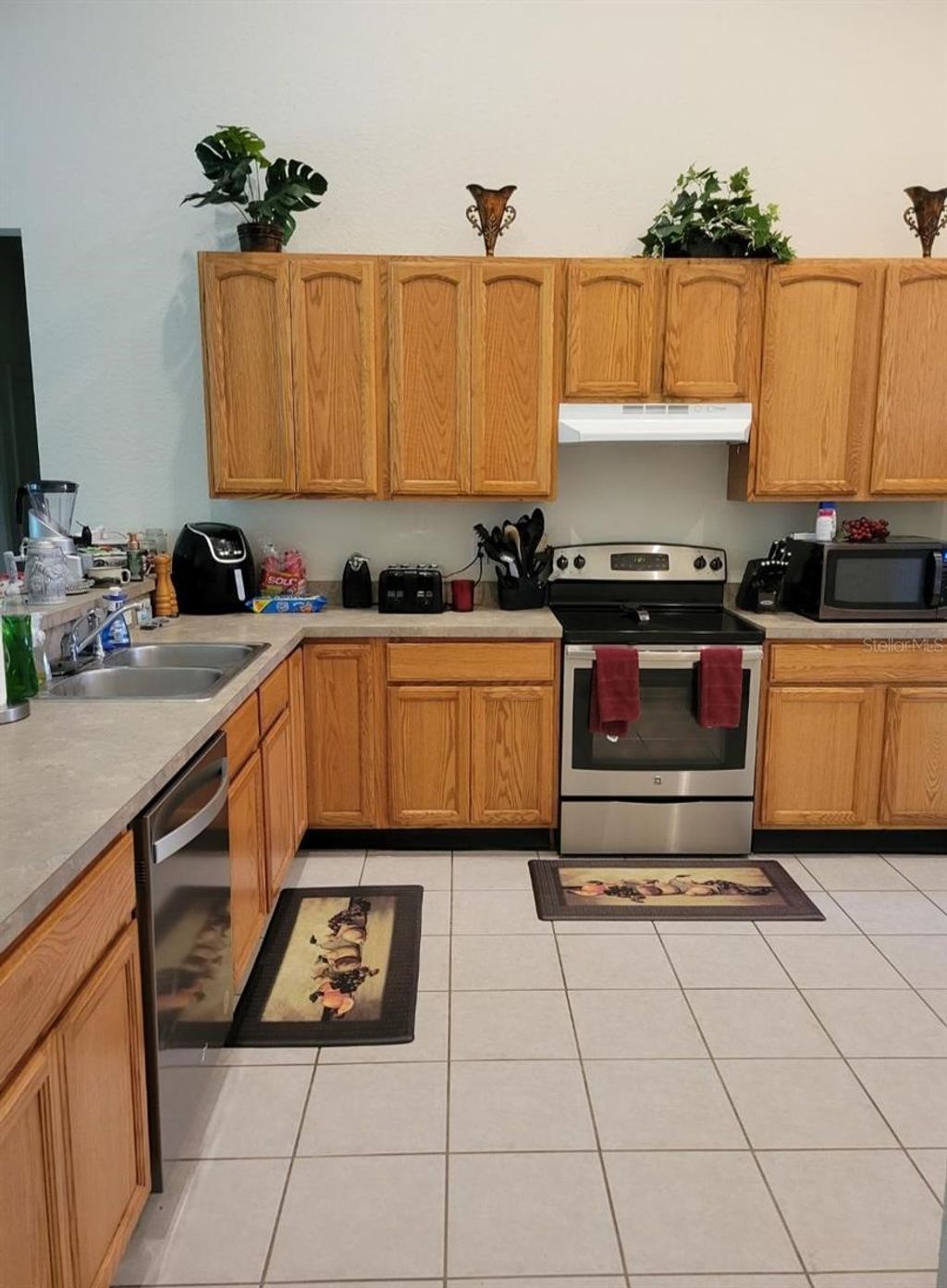 Photo of 5419 Oxford Manor Circle, Lakeland, FL 33810 (MLS # L4960341)