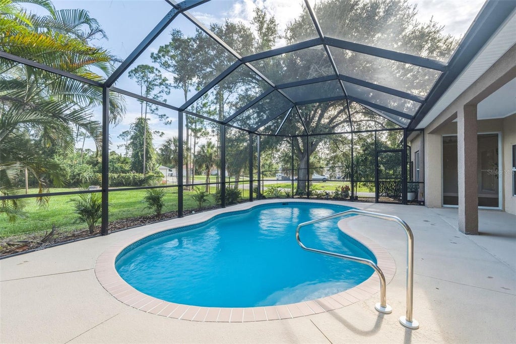 Photo of 1464 Halacka Road, North Port, FL 34288 (MLS # C7530052)