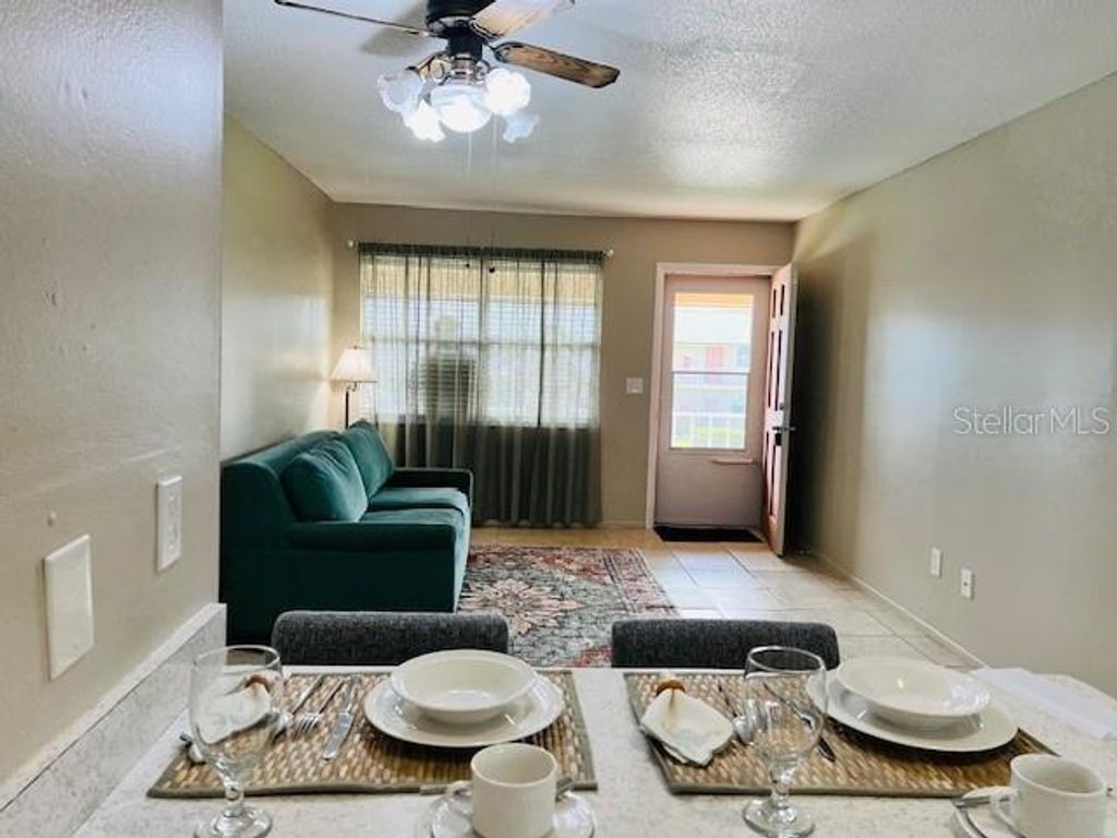 Photo of 1100 E Caroline Street #203, Tavares, FL 32778 (MLS # O6348369)