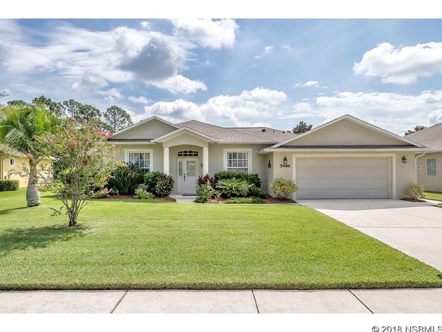 Pride of ownership shows in this beautifully landscaped & well-kept contemporary 4 bedroom, 2 bath, 2 car garage home conveniently located in The Vineyards, in desirable Port Orange. Located on a cul-de-sac, this home has tranquil pond views from the 8X21 covered porch & 12X21 screened, paver patio, perfect for outdoor entertaining for family & friends! This home features a beautiful entry foyer w/ a den/living/bonus room to the left & formal dining room to the right, then you enter into a spacious open floorplan family room that overlooks the porch area through sliding doors. Kitchen with wood cabinetry features breakfast bar, breakfast nook & pantry closet. Spacious master bedroom has a master bath with garden tub, walk-in shower, double sinks, water closet, walk-in closet & linen closet. Interior laundry room with ceramic utility sink & cabinetry. Brand new carpet. Sun tunnel for added light in kitchen/breakfast nook area. March 2016 HVAC. Security system. Outdoor security lighting. Lawn irrigation system on reclaimed water. Oversized 24 wide by 21 deep garage. Hurricane shutters. Natural gas water heater & dryer. In-wall pest tube system. 2 walk-in closets. On Q technology wiring with panel in garage. Termite bond. Minutes from shopping, restaurants, medical facilities, colleges, airport, major highways and only about an hour to Orlando, St Augustine. All information deemed to be correct but not warranted. Buyers to perform due diligence to verify all data & measurements prior to making offers. Donât miss out on your opportunity to own your own piece of paradise in the warm, Florida sunshine! ;Water: City