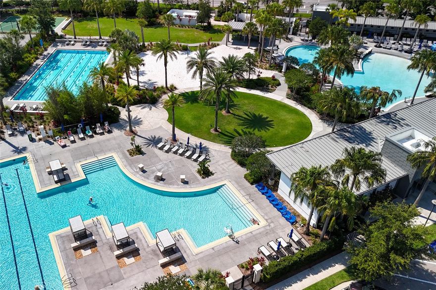 This rare Lake Nona gem immediately impresses with its premium tile roof — a statement features and a valuable investment in today’s market. Situated on a desirable corner lot, the home offers a spacious, open layout filled with natural light from the many surrounding windows. All windows throughout the home include installed blinds — already in place and included. As you enter through the paved front patio, you are welcomed by soaring ceilings and a wide staircase to the left. Straight ahead, a generous hallway leads to a versatile flex room with elegant French doors — perfect for a home office, craft room, or study.
Beautiful wood and tile flooring run throughout the home, offering both warmth and durability. The open-concept main living area seamlessly connects the kitchen, dining, and living spaces, creating an inviting atmosphere for gatherings and entertaining. A stunning multicolored brick accent wall in the living area adds character and designer charm.
The kitchen features 48” wood cabinetry, quartz countertops, and stainless-steel appliances — all included: refrigerator, dishwasher, microwave, and oven.
On the main floor, you will also find a spacious half bathroom and access to the two-car garage, which includes installed ceiling-mounted metal storage shelves — a practical bonus for organized storage. Across from the garage is a door leading to the covered, paved back porch and fenced backyard — ideal for relaxing or entertaining outdoors.
The property offers exceptional parking: a two-car garage, a covered carport, and a large, paved driveway that accommodates up to eight vehicles.
Upstairs, the thoughtfully designed second floor continues to impress. At the top of the stairs, you’ll find a bedroom, followed by a spacious open balcony — a wonderful spot to relax. Next is a laundry room with built-in cabinets for additional storage. Down the hall is another bedroom and a full bathroom.
All bedrooms are equipped with ceiling fans for comfort.
The primary suite is generously sized and features a huge master bathroom with dual separate vanities, two separate closets with built-in cabinetry, and plenty of space for comfort and organization.
The home is equipped with a Lennox AC system, providing reliable and efficient climate control.
Recently painted inside and out, this home is move-in ready and meticulously maintained. It offers a quiet, warm feeling — like peaceful living tucked into the heart of vibrant town life.
Located in highly desirable Lake Nona, this home provides convenient access to:
- Lake Nona Town Center for shopping, dining, and events, 
- Nona Adventure Park for wakeboarding, aqua park fun, and climbing, 
- Lake Nona Sculpture Garden, a 50,000-square-foot outdoor art space, 
- Moss Park for hiking, biking, picnicking, and beach access, 
- Lake Nona Medical City, 
- The USTA National Campus, the largest tennis facility in the nation. 
You’re also just a short drive from Orlando International Airport, major highways, Disney, Universal Studios, and Florida’s beautiful beaches.
Top-rated schools (10/10) serve the area, making this location even more desirable.
This is truly a dream community — offering peaceful surroundings without sacrificing convenience. Why drive 1–2 hours to rural areas for quiet living when you can enjoy that same peaceful feeling right here in the center of it all?