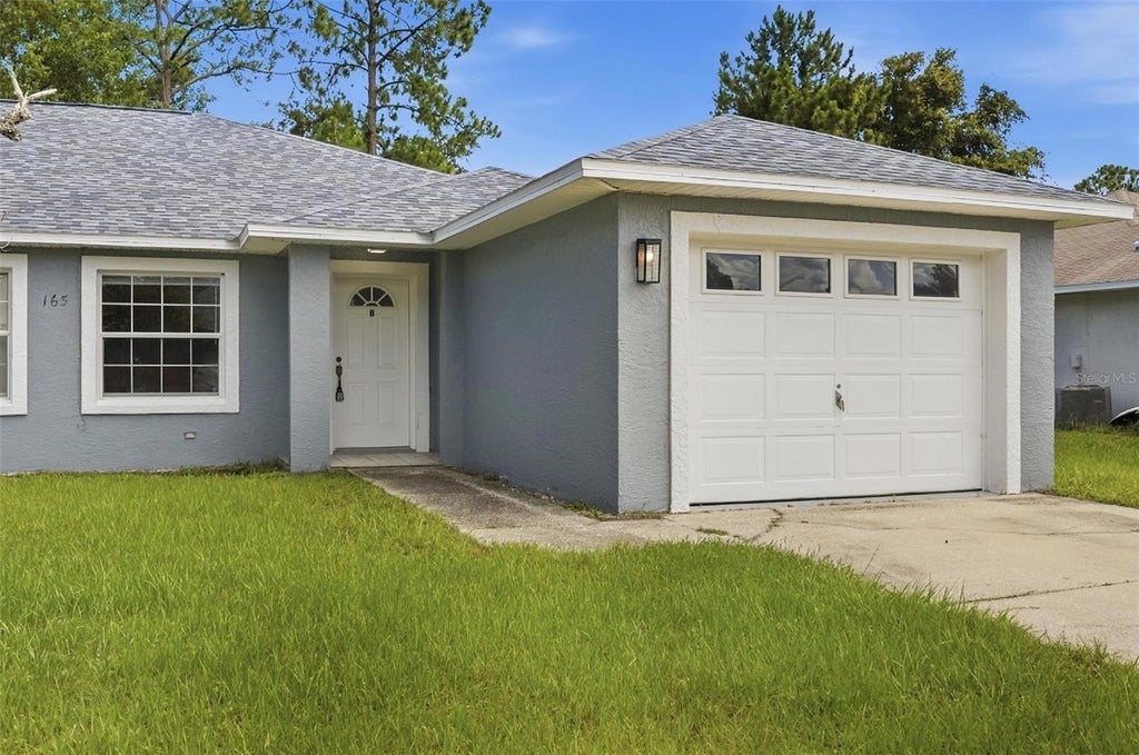 Photo of 165 Plain View Drive #B, Palm Coast, FL 32164 (MLS # FC319162)